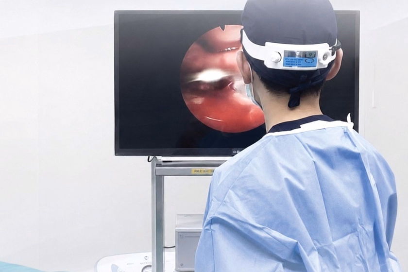 A DCH Surgeon Viewing The Endoscopic Monitor During Surgery