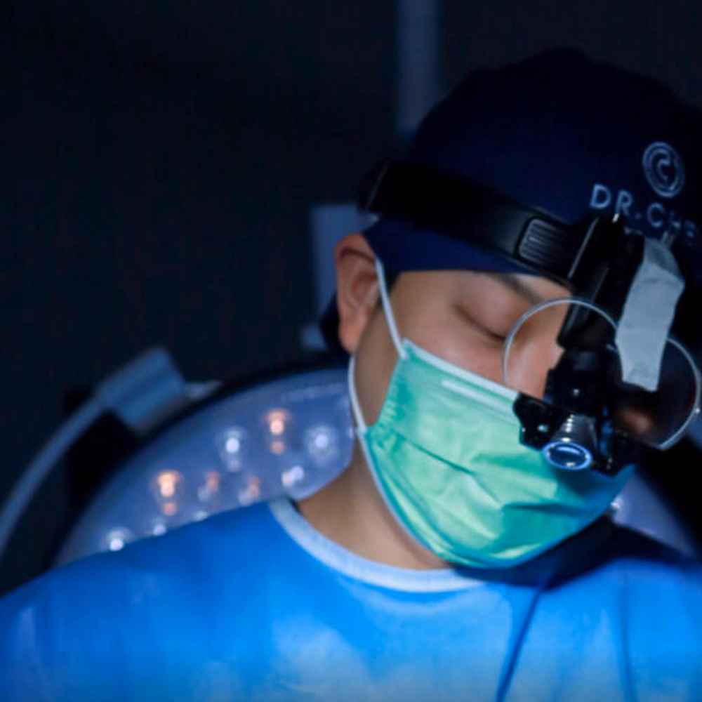 Dr Chen Wearing Surgical Magnification Equipment At DCH Hospital