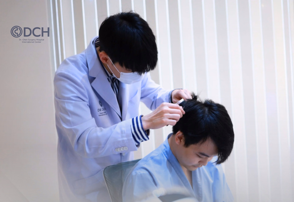 Clinician Examining The Scalp Before Hair Transplant Planning